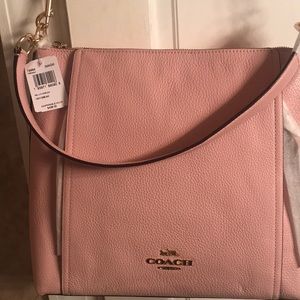 Coach pocketbook, and pink shoes I will be going out of business soon